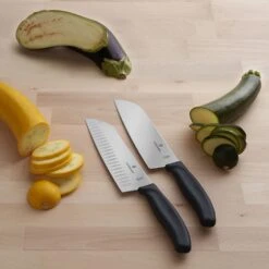 Victorinox Swiss Classic 17cm Santoku Knife Fluted Blade Orange (6852617L9B) -Kitchenknives Shop cut 6 8523 17b 6 8503 17g g santoku ls 2