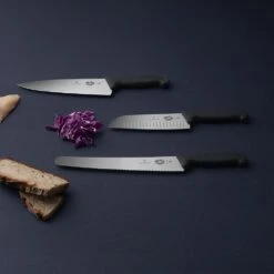 Victorinox Fibrox 19cm Chefs Knife Serrated Edge (5203319) -Kitchenknives Shop cut fibrox b2 chef ls1 1 1