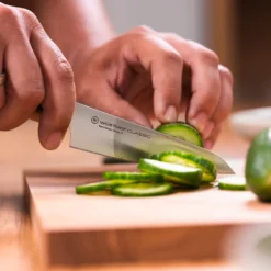 Wusthof Classic Asian 12cm Utility Knife (WT1040136812) -Kitchenknives Shop wusthof classic asian utility knife lifestyle cutting cucumber borough kitchen 900x